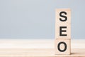 SEO Search Engine Optimization text wooden cube blocks on table background. Idea, Strategy, marketing, Keyword and Content Royalty Free Stock Photo