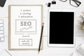 SEO sketch goals and tablet mockup on office desk. Web site search optimization concept Royalty Free Stock Photo