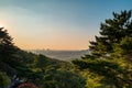 Seoul city building at sunset from Yongamsa Temple in Bukhansan National Park, Seoul, South Korea