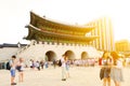 SEOUL, KOREA - AUGUST 14, 2015: Lots of people walking inside Gyeongbokgung Palace - the main royal palace of the Joseon dynasty - Royalty Free Stock Photo