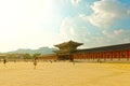 SEOUL, KOREA - AUGUST 14, 2015: People walking by Gyeongbokgung Palace - the main royal palace of the Joseon dynasty - Seoul, Sout