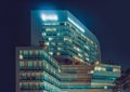 SEOUL, KOREA - AUGUST 12, 2015: New campus of Yonsei Univercity Cancer Center at night - writing on the building means Royalty Free Stock Photo