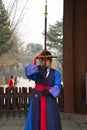 The gatekeepers standing at the entrance of Deoksugung Palace