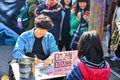 Seoul, Korea - March 7, 2015 : street artist draws a portrait caricature of a little girl at Free Market