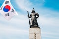 Admiral Yi Sun-Shin statue with Korean national flag Taegeukgi in Seoul, Korea