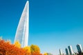 Lotte world tower and Seokchon lake with autumn maple in Seoul, Korea