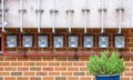 Individual gas meters on the wall of a residential building Royalty Free Stock Photo