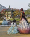 SEOUL - OCTOBER 21, 2016: Autumn at Gyeongbokgung Palace in Seoul,Korea.Young girls in traditional dresses