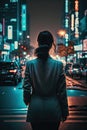 Seoul\'s night view, the back of a person standing far away in the middle of the road