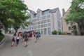 SEOUL, SOUTH KOREA - AUGUST 2012 - Group of female students walking up a hill towards Posco Building, Ewha Womans University