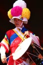 Korean drummer playing the traditional hourglass-shaped drum also known as janggu