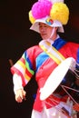 Korean drummer playing the traditional hourglass-shaped drum also known as janggu