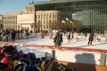 Ice skaters enjoying a sunny December afternoon