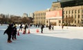 Ice skaters enjoying a sunny December afternoon