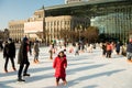 Ice skaters enjoying a sunny December afternoon