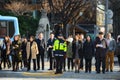 Seoul, South Korea - December 16, 2015 : Unidentified pedestrians waiting to cross road in Gwanghwamun square