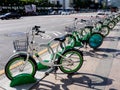 Seoul, South Korea - June 3, 2017: Bright green bicycles parked on the sidewalk in downtown in Seoul