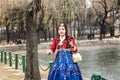 Seoul, South Korea, 12/30/2017: Korean girls in hanboks take a selfie in a winter park. Close-up