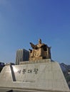 SEOUL, SOUTH KOREA - OCTOBER 23, 2022: Golden Statue of King Sejong the Great near the center of Gwanghawmun Square, in front of