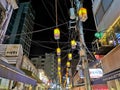 SEOUL, SOUTH KOREA - OCTOBER 23, 2022: Grilled pork and beef alley in the middle of Seoul city center with traditional lanterns