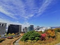 SEOUL, SOUTH KOREA - OCTOBER 26, 2022: Hilton hotel buildings scene from Baekbeom Plaza in Namsan Mountain Park with colourful Royalty Free Stock Photo