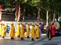 Musicians in yellow uniform in front of a large drum at the changing of the Royal Guard ceremony at Deoksugung Palace in Seoul Royalty Free Stock Photo