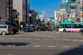 Seoul, South Korea - October 19, 2019: People cross the road. Busy intersection in the Yeongdeungpo area. Royalty Free Stock Photo