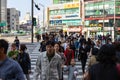 Seoul, South Korea - October 19, 2019: People cross the road. Busy intersection in the Yeongdeungpo area. Royalty Free Stock Photo