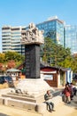 Column with carved dragons in garden of Jogyesa