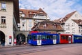 Old Swiss style building and tram in old town of Bern, Switzerland