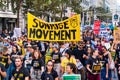 Sep 20, 2019 San Francisco / CA / USA - Sunrise Movement an American youth-led political movement members carrying placards and