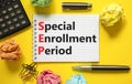 SEP symbol. Concept words SEP Special enrollment period on beautiful white note. Beautiful yellow table yellow background.