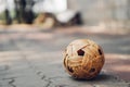 Sepak Takraw ball on pavement tiled bricks with copy space. South East Asia famous local sport or Asian activities concept