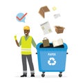 Separate garbage collection. African american man in uniform stands near trash can. Paper and cardboard items fall in separate