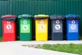 Separate garbage collection. Waste recycling concept. Containers for metal, glass, paper, organics, plastic for further processing Royalty Free Stock Photo