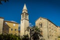 The bell tower Sahat Kula and the Church of St John the Baptist Sveti Ivan in Budva, Montenegro