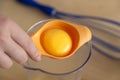 Separating protein and yolk for making dough and cream for biscuit and cake dessert Royalty Free Stock Photo