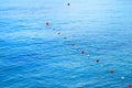 Separation buoys in the sea for safe swimming on the beach Royalty Free Stock Photo