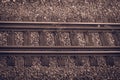 A sepia colored railroad track