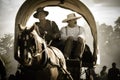 Sepia Covered Wagon in civil war reenactment Royalty Free Stock Photo