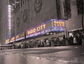 Sepia New York With a Festive Neon Radio City Music Hall Royalty Free Stock Photo