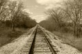 sepia old photograph abandoned disused rusty rural train tracks transportation railway countryside transport rails history