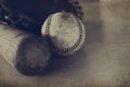 Sepia tone baseball image with vintage texture, shows bat, ball and glove. Royalty Free Stock Photo