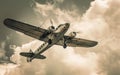 Sepia-toned image capturing a vintage dual-engine aircraft with star insignia ascending against a cloudy sky backdrop