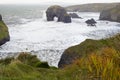 Sepia virgin rocks and cliffs with storm waves Royalty Free Stock Photo