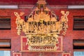 28 Sept - Hong Kong: Decoration in a traditional temple. Chinese god sculpture in gold, hang in the celing