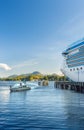 Sept. 17, 2018 - Ketchikan, AK: Sea Otter Express returing to port alongside Island Princess cruise ship. Royalty Free Stock Photo