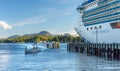 Sept. 17, 2018 - Ketchikan, AK: Sea Otter Express returing to port alongside Island Princess cruise ship. Royalty Free Stock Photo