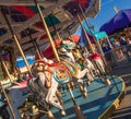 Sept. 2, 2012 - Vancouver, Canada: Detail of colourful vintage carousel horse ride at annual PNE Fair, late afternoon.