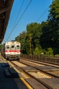 A Septa train is on the tracks at a train station, Philadelphia Royalty Free Stock Photo